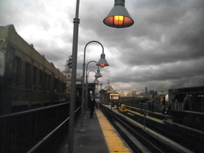 View from the top platform at the Marcy train station (on the J line) looking out in the direction of the Williamsburg bridge.